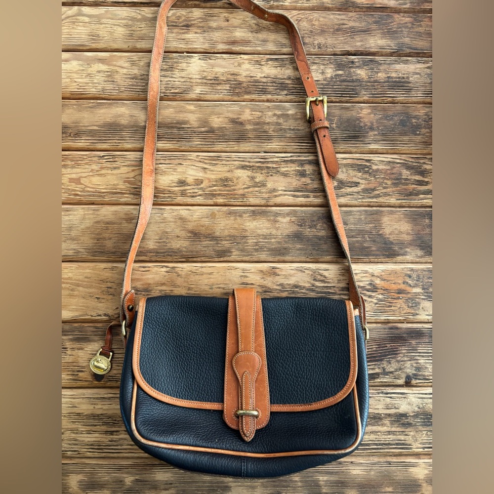 Dooney & Bourke Black and Tan Crossbody Bag with Leather Accents